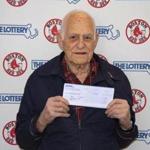 Jim Aylward with his Massachusetts State Lottery check. 